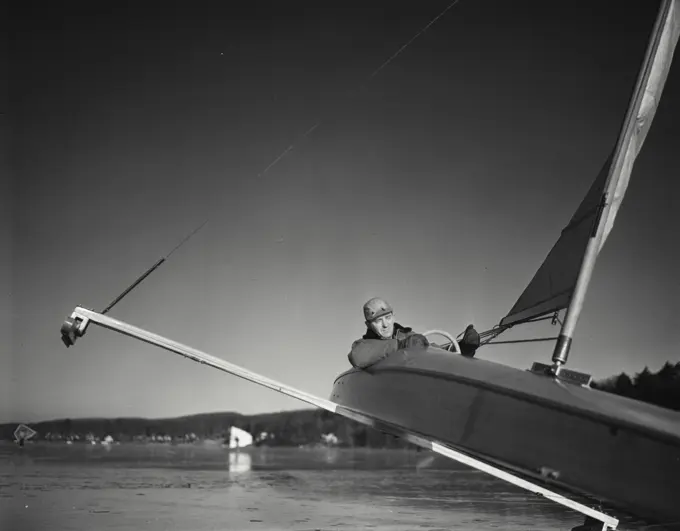 Vintage Photograph. Iceboating- closeup of man in boat.