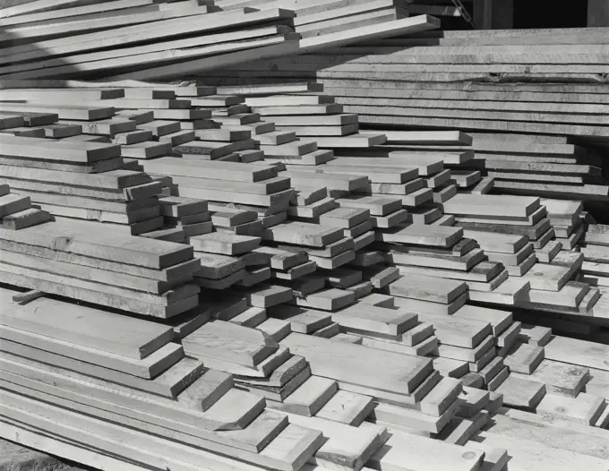 Vintage Photograph. Lumber at building site for new building under construction on 47th Street, New York City