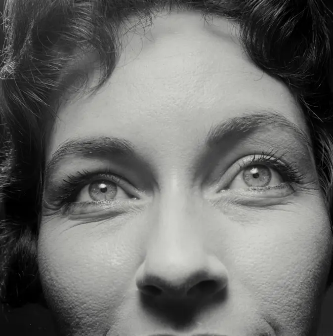 Vintage Photograph. Closeup of woman's eye brows.