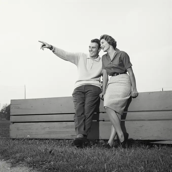 Vintage Photograph. Portrait of young couple in golf clothes. Frame 5