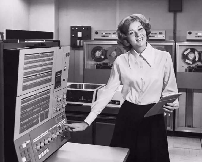 Portrait of a businesswoman operating a computer