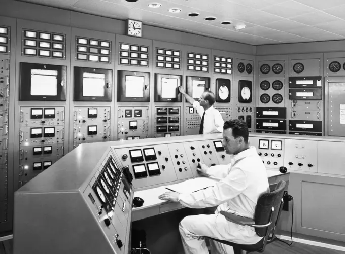 Scientists working in a control room of a laboratory, Stockholm, Sweden