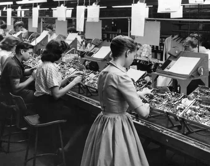 Manual workers assembling television chassis in a television plant, Motorola television plant