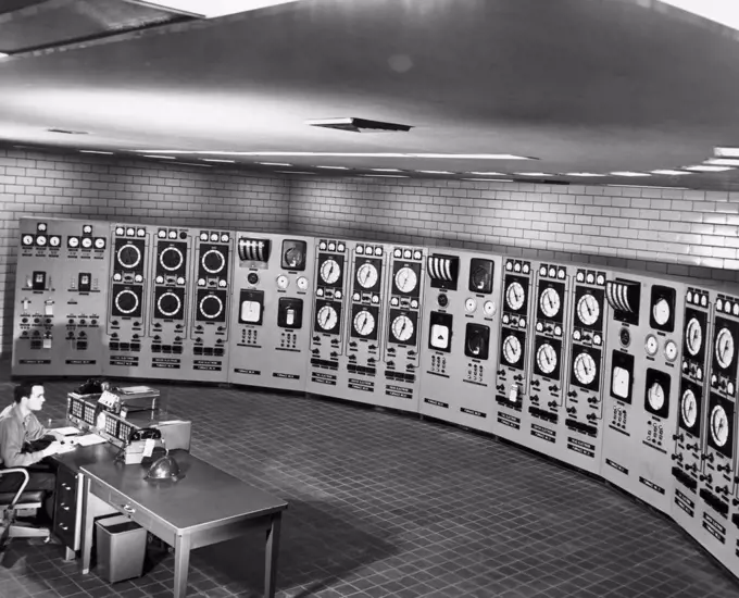 Male technician working in a control room, Electro Metallurgical Company, Marietta, Ohio, USA