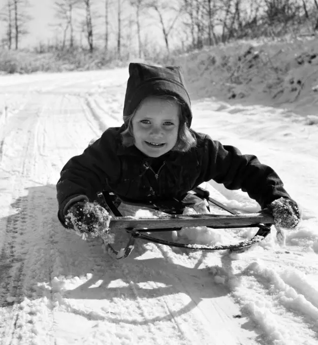 Girl on sledge