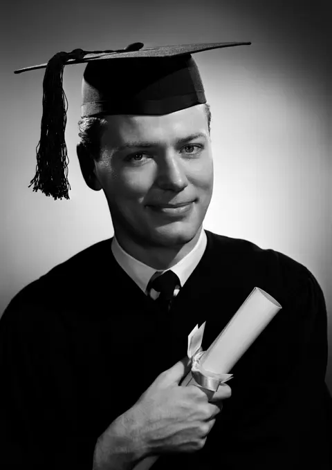 Portrait of man in graduating gown