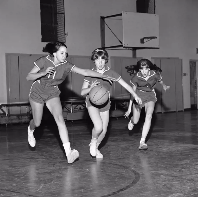 Girls playing basketball