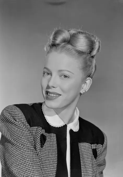 Portrait of elegant woman with hairbun