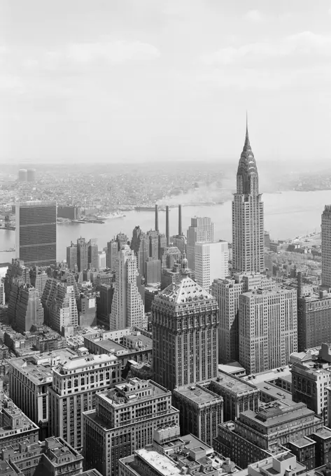 USA, New York State, New York City, Roof view looking Southeast from radio city with Chrysler Building and United nations buildings toward Long Island