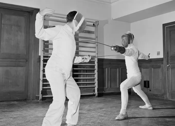 Two fencers fighting