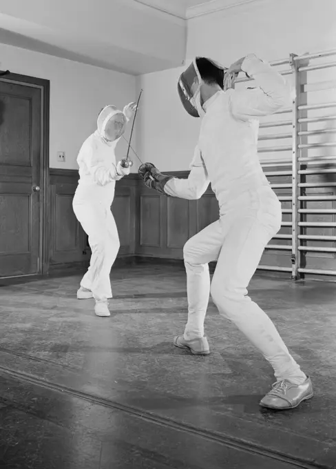 Two fencers fighting