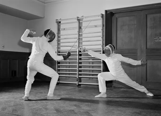 Two fencers fighting