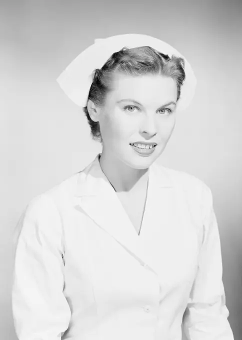 Studio portrait of female nurse