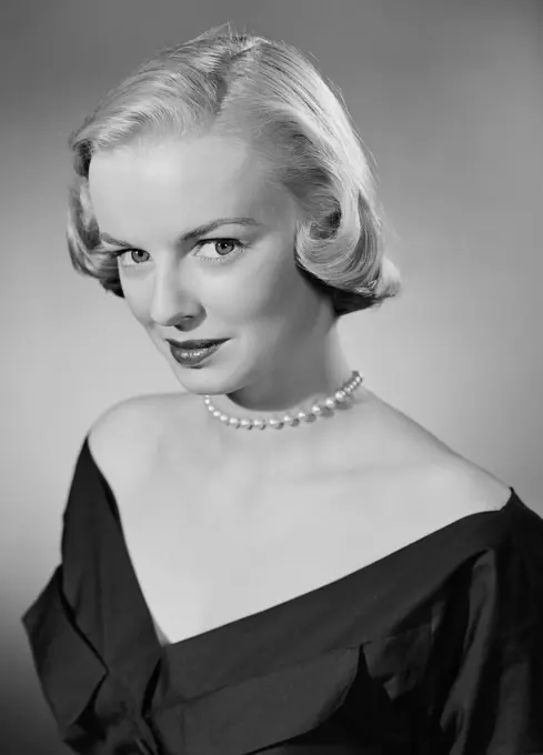 Studio portrait of young woman