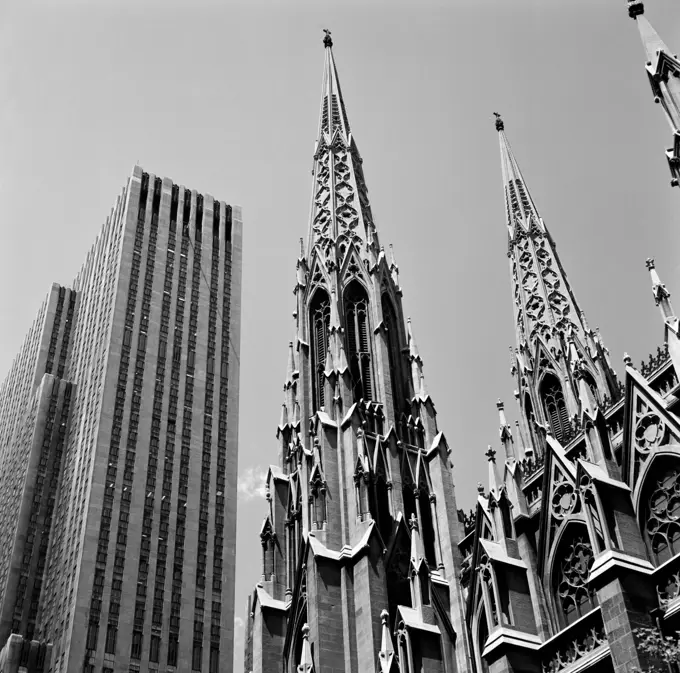 USA, New York City, Pinnacle of neogtohic church against modern skyline