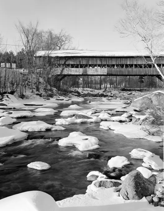 USA, New Hampshire, Jefferson, Winter Landscape with wooden covered bridge