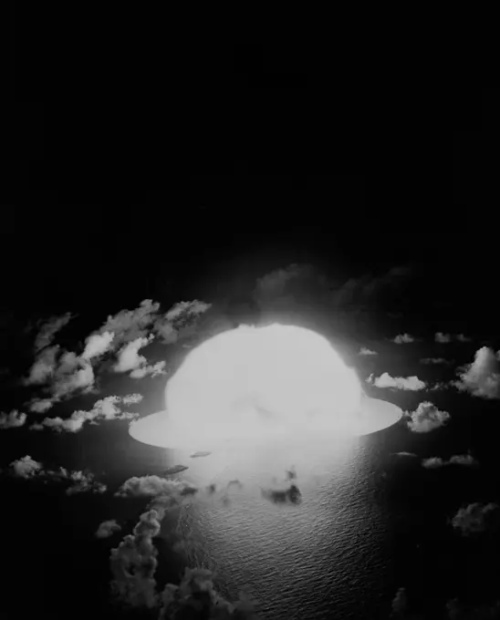 Eniwetok Atoll, beginning moments of nuclear detonation as seen from above the Eniwetok test site in 1951