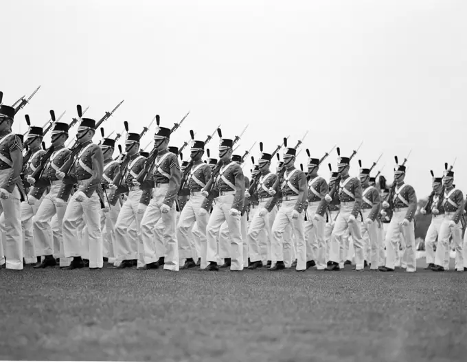 Soldiers marching in parade formation