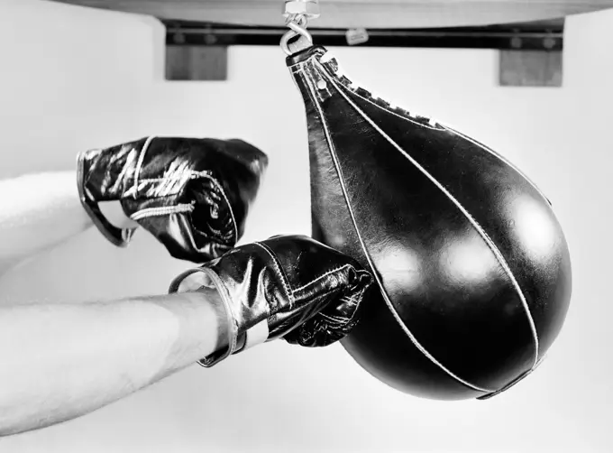 Boxer hitting punching bag