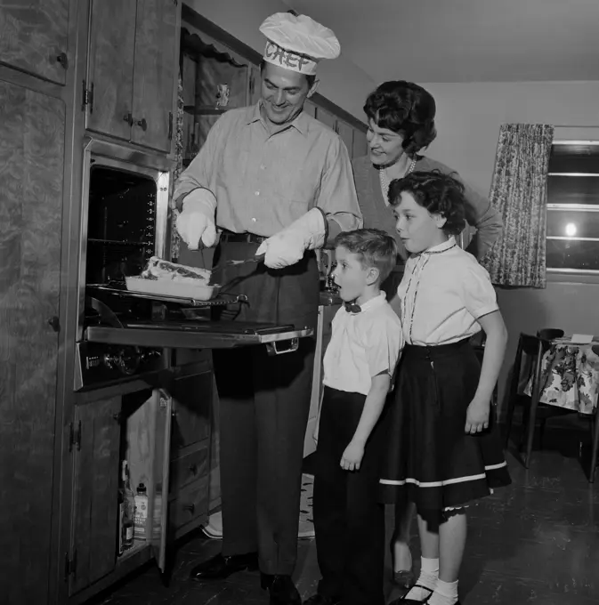 Parents with kids cooking food