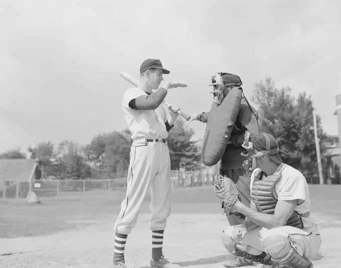 Baseball players discussing