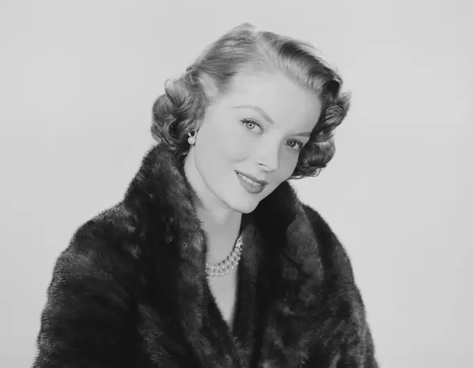 Studio portrait of young woman