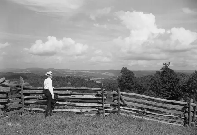 Farmer at rail fence.  Scene looking east from Laural Mountain, on U.S. Route 50 (Old North Western Pike). West Virginia