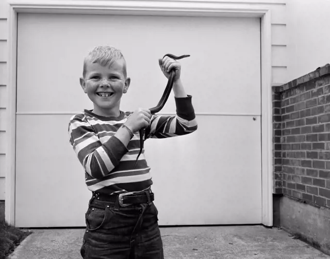 Boy holding Garter Snake