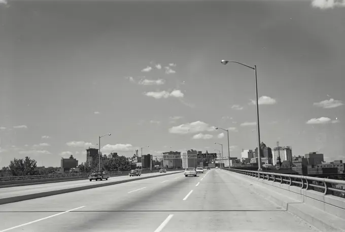 Vintage Photograph. The Richmond-Petersburg Turnpike with the skyline of Richmond in the background. Frame 2