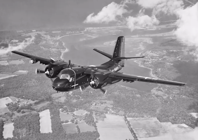 High angle view of a military airplane in flight, S2F Sub-Killer