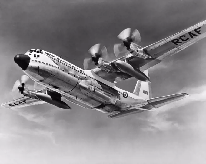 Low angle view of a fighter plane in flight, C-130E Hercules, Royal Canadian Air Force