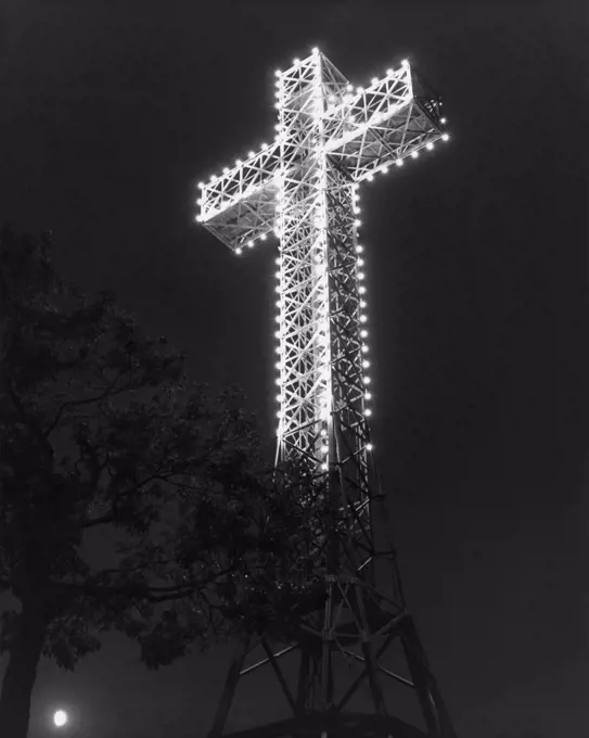 Low angle view of a cross lit up at night, Mount Royal, Montreal, Canada