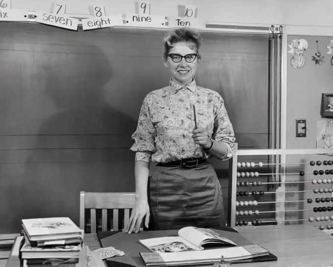 Teacher smiling in a classroom