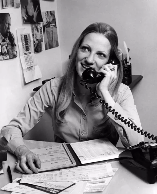 Women with long hair talking on phone