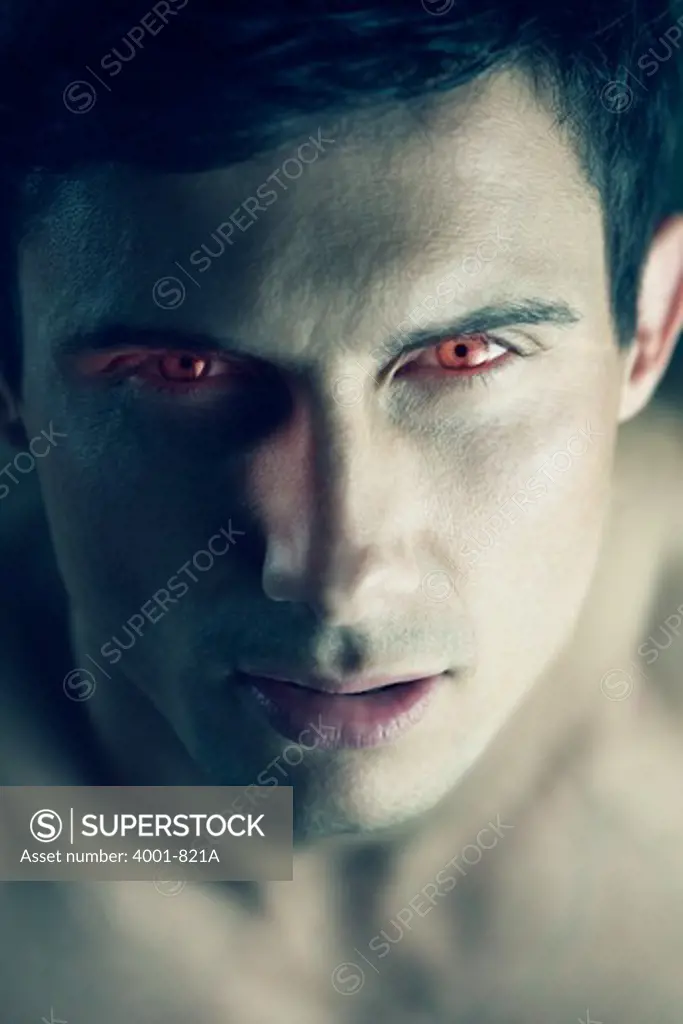 Portrait of a vampire with red eyes