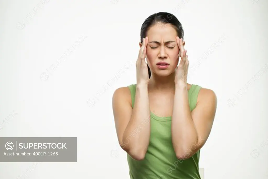 Young woman suffering from a headache