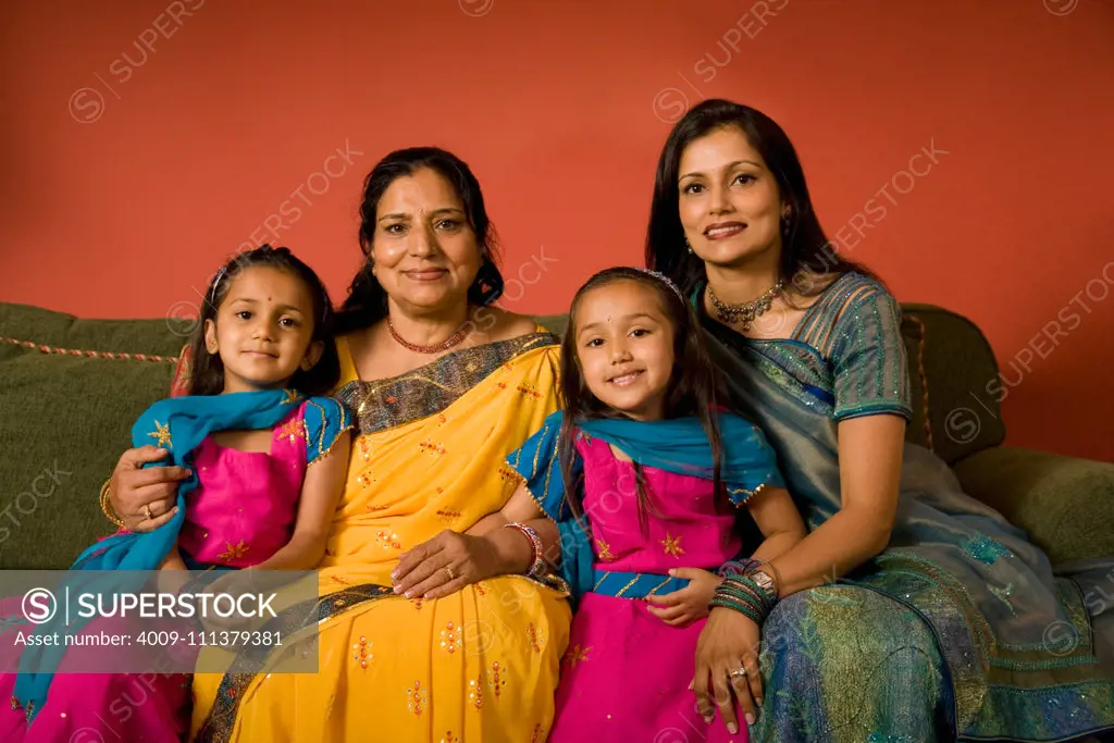 Multi-generational Indian family in traditional dress