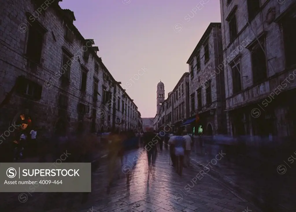 People on a busy street at dusk, Dubrovnik, Croatia