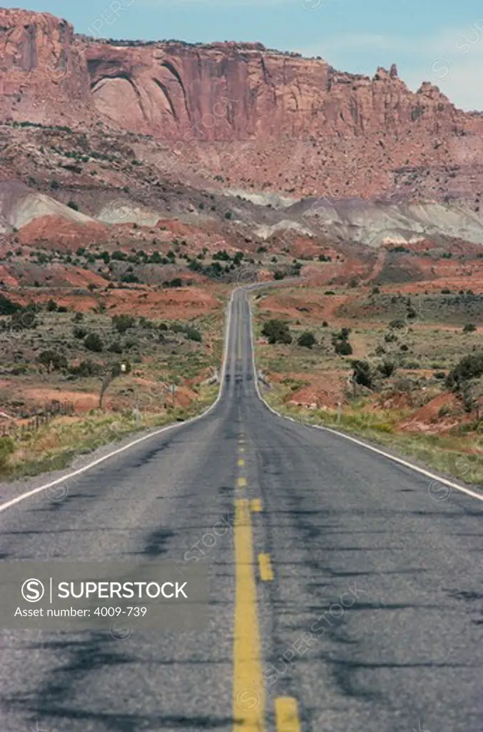 Highway leading to mountain range, Historic Route 66, Utah, USA