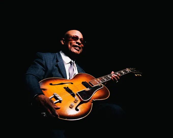 African American man with guitar