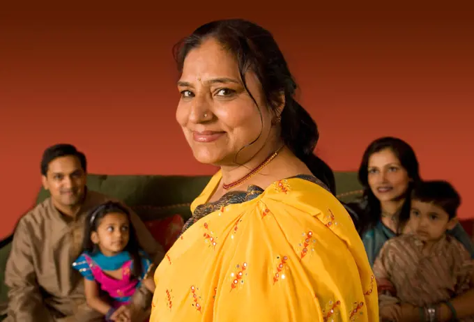 Multi-generational Indian family in traditional dress