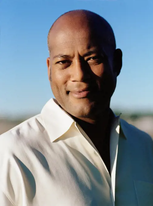 African American man smiling outdoors