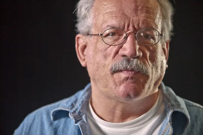 Serious older man wearing eyeglasses