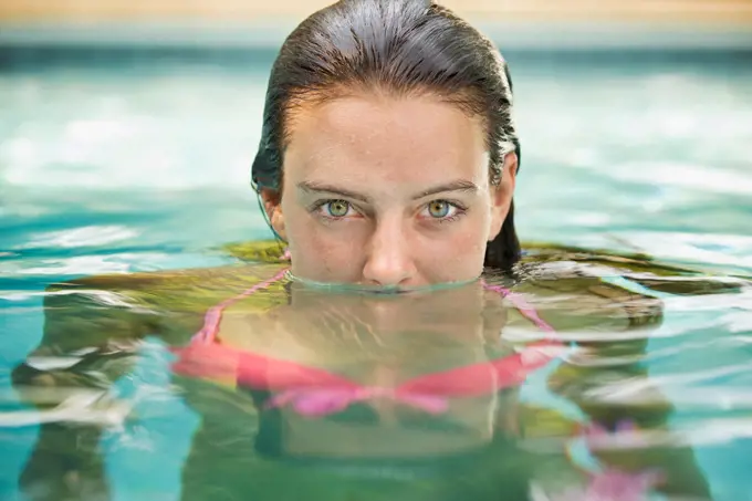 Woman swimming in pool