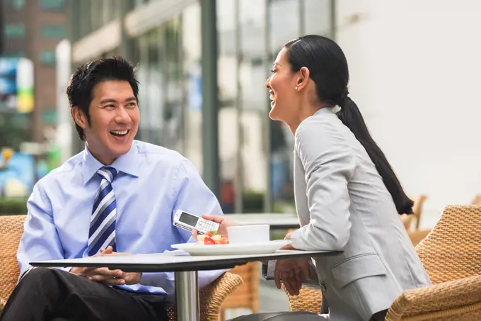 Business people talking in cafe