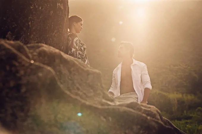 Hispanic couple on rocks