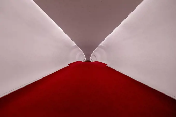 Long hallway with no people at the TWA hotel designed by Eero Saarinen at JFK Airport