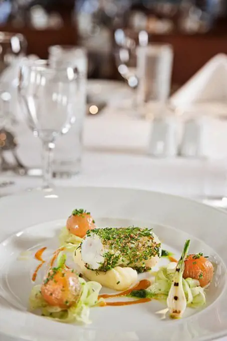 Gourmet fish and vegetables served in a plate