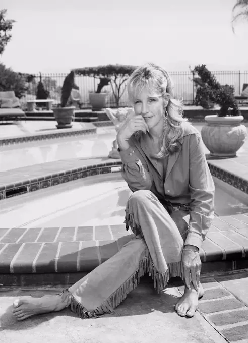 Portrait of Erin Brockovich  at her home in California by Photographer Stewart Cohen for his book titled Identity