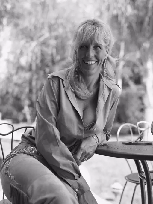 Portrait of Erin Brockovich  at her home in California by Photographer Stewart Cohen for his book titled Identity